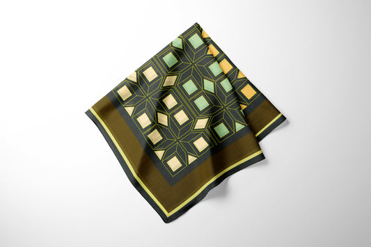 Decorative silk scarf with geometric pattern on a white background